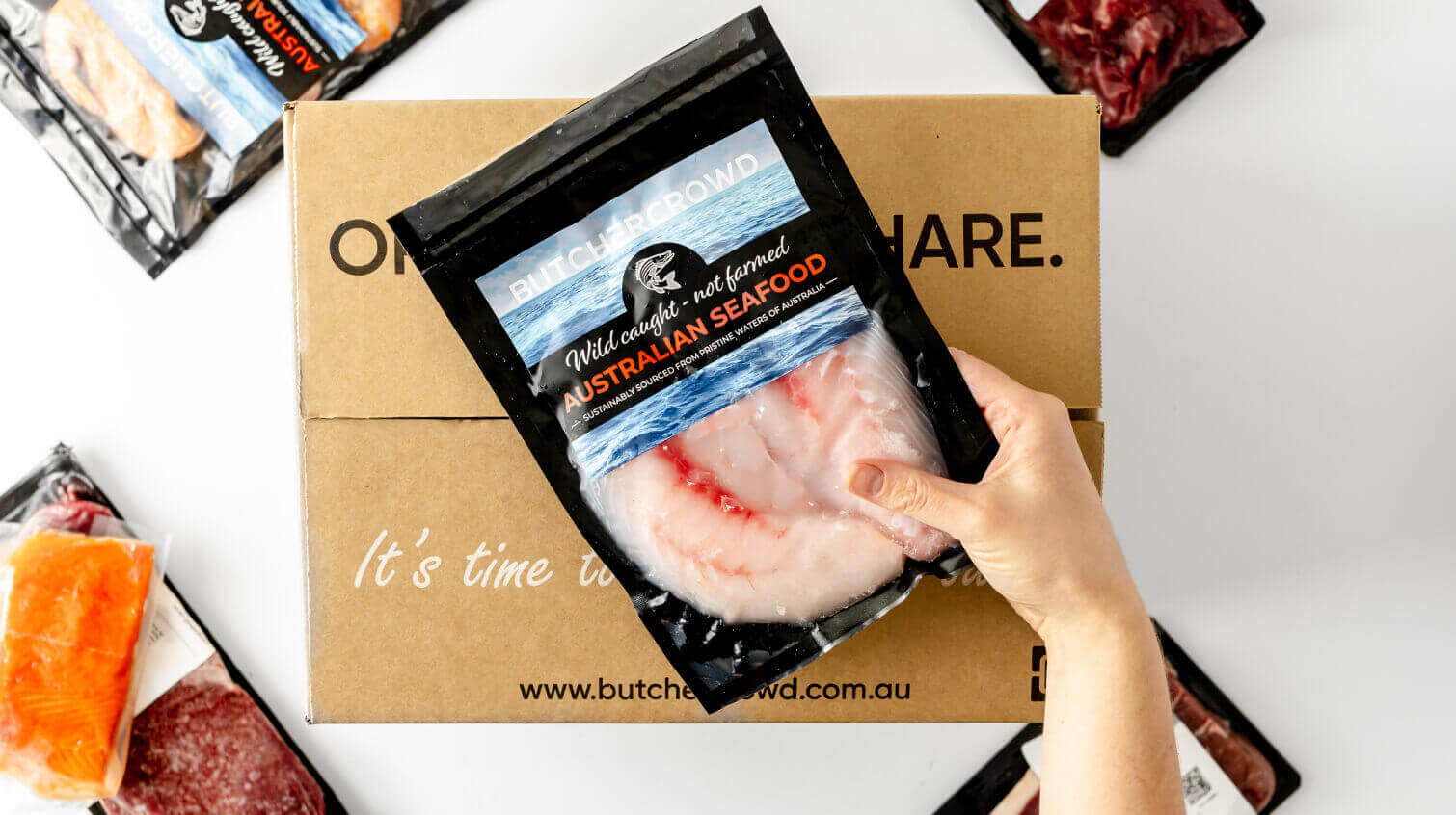 Someone unpacking a valuable box of protein ready to be served